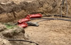 Installatie kabbelmoffen in zand